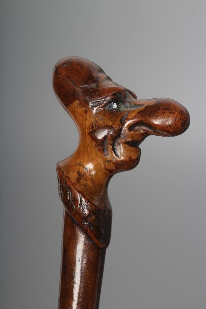 TWO GROTESQUE NOVELTY WALKING CANES Image