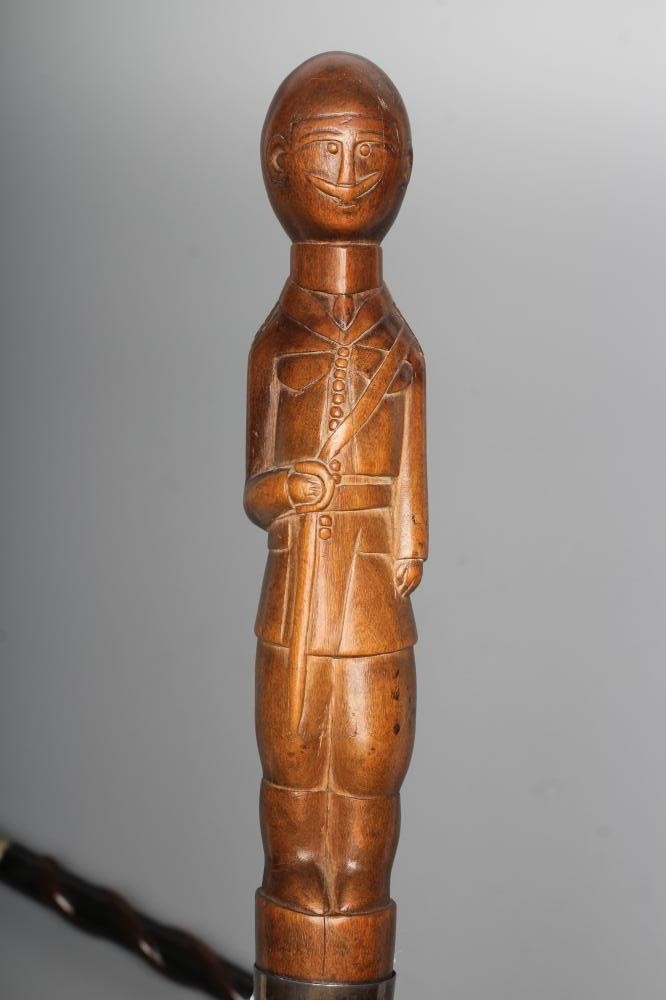 TWO TWIST CARVED WALKING CANES Image