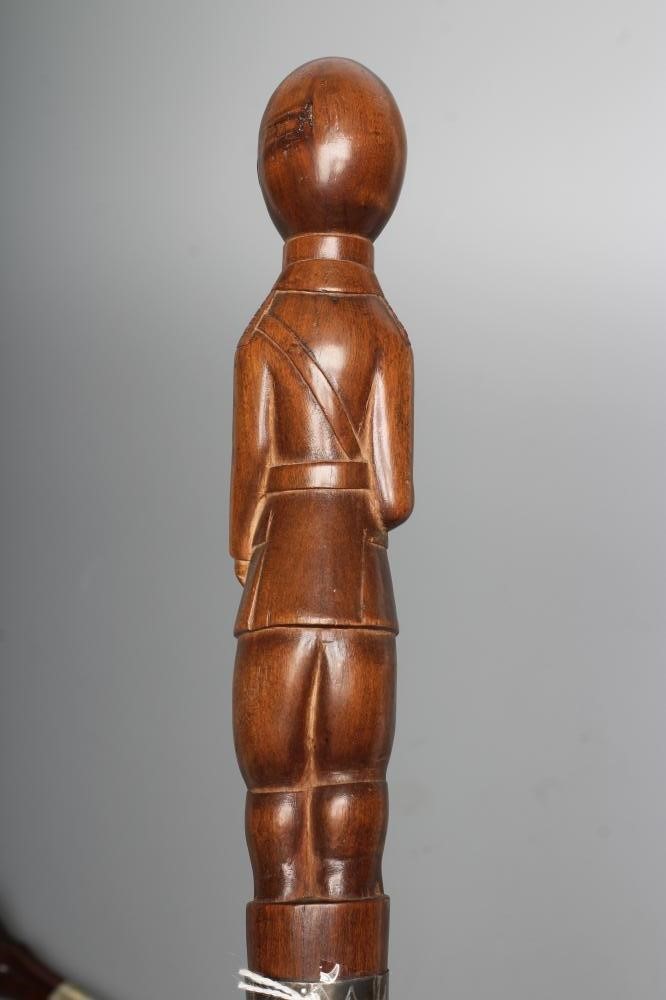 TWO TWIST CARVED WALKING CANES Image