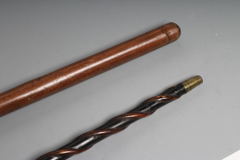 TWO TWIST CARVED WALKING CANES Image