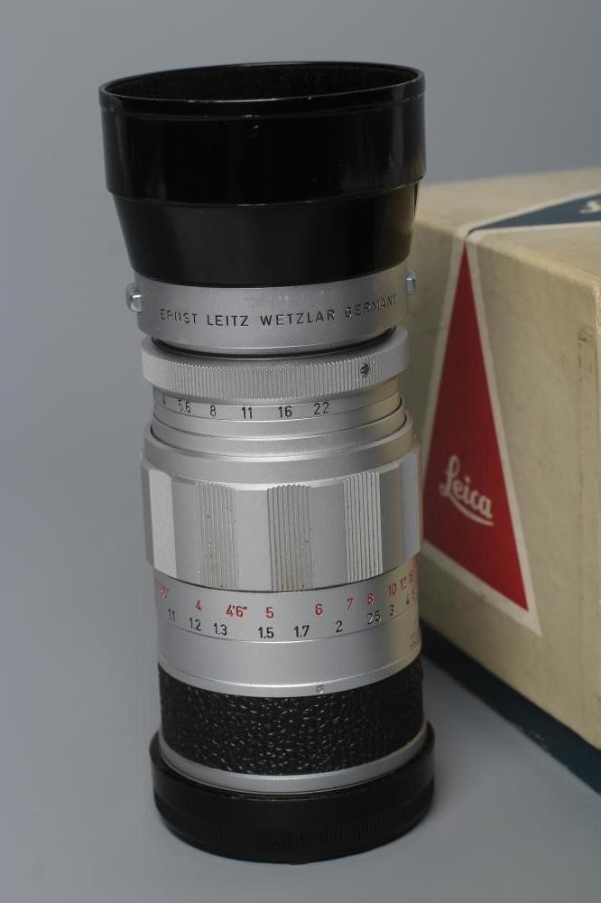 A LEITZ WETZLAR ELMARIT LENS, 1:2.8/90, 1692527, together with a Leitz Visoflex II (2) (Est. plus Image