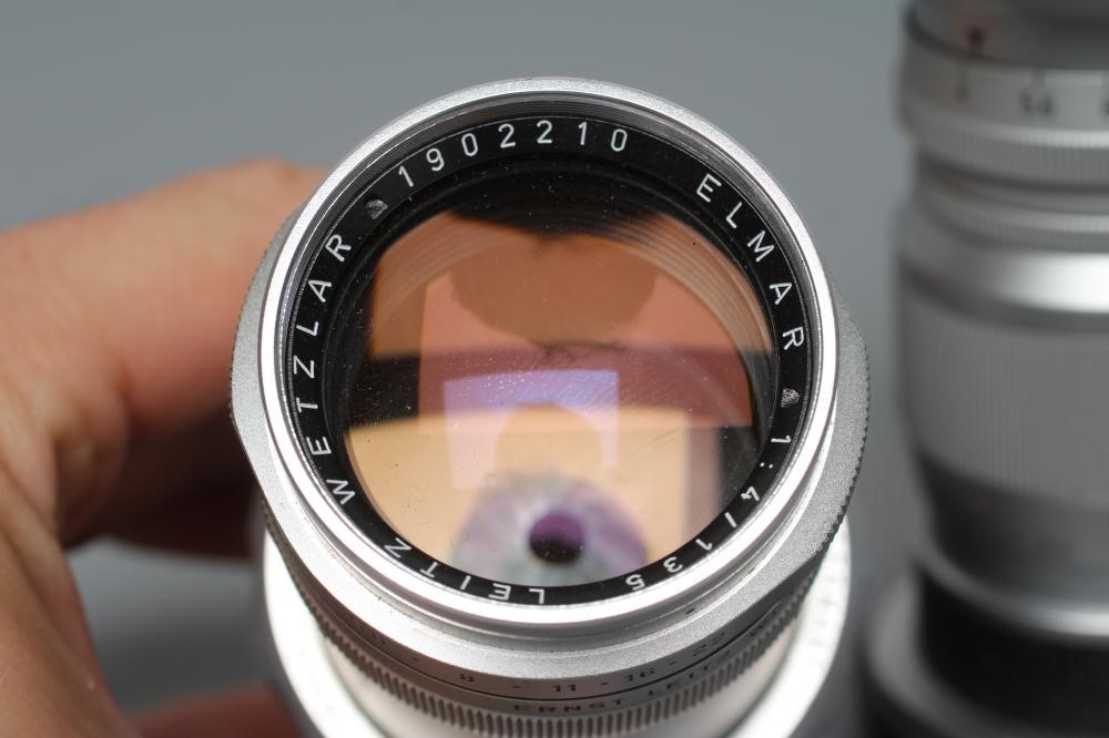 TWO LEITZ WETZLAR ELMAR LENSES, comprising a 1:4/135 1902210 and a 1:4/90 1822376 (Est. plus 24% Image