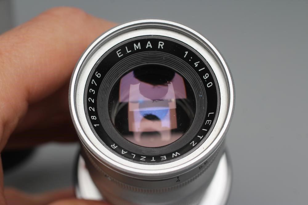 TWO LEITZ WETZLAR ELMAR LENSES, comprising a 1:4/135 1902210 and a 1:4/90 1822376 (Est. plus 24% Image