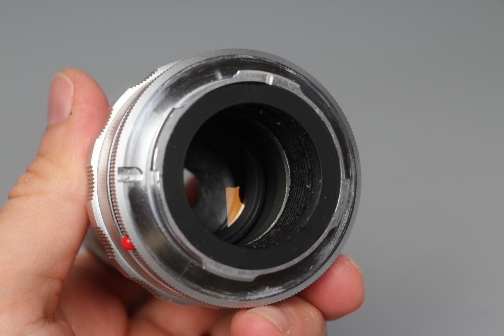 TWO LEITZ WETZLAR ELMAR LENSES, comprising a 1:4/135 1902210 and a 1:4/90 1822376 (Est. plus 24% Image