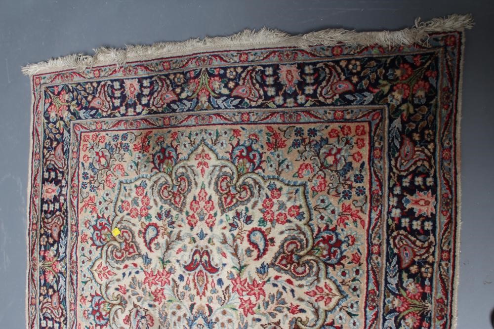 A PERSIAN RUG Image
