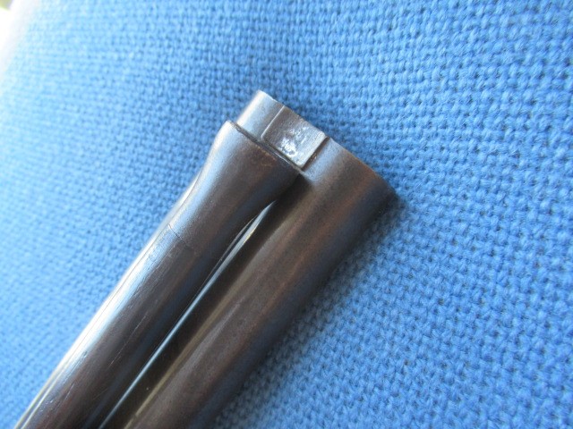 A WILLIAMS & POWELL PERCUSSION 14 BORE DOUBLE BARRELLED SHOTGUN Image