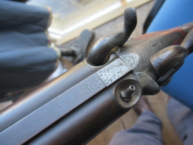 A WILLIAMS & POWELL PERCUSSION 14 BORE DOUBLE BARRELLED SHOTGUN Image