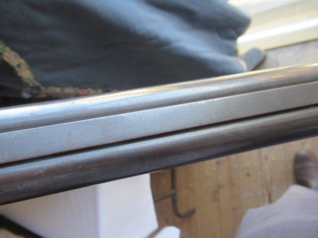 A WILLIAMS & POWELL PERCUSSION 14 BORE DOUBLE BARRELLED SHOTGUN Image