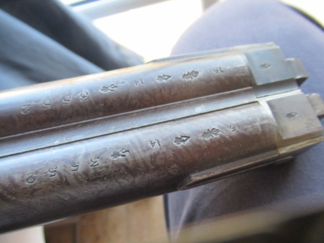 A WILLIAMS & POWELL PERCUSSION 14 BORE DOUBLE BARRELLED SHOTGUN Image