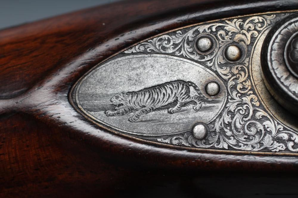 A WILLIAMS & POWELL PERCUSSION 14 BORE DOUBLE BARRELLED SHOTGUN Image