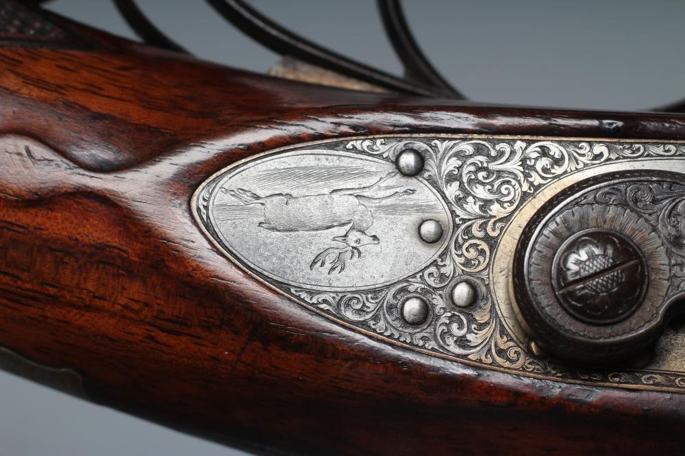 A WILLIAMS & POWELL PERCUSSION 14 BORE DOUBLE BARRELLED SHOTGUN Image