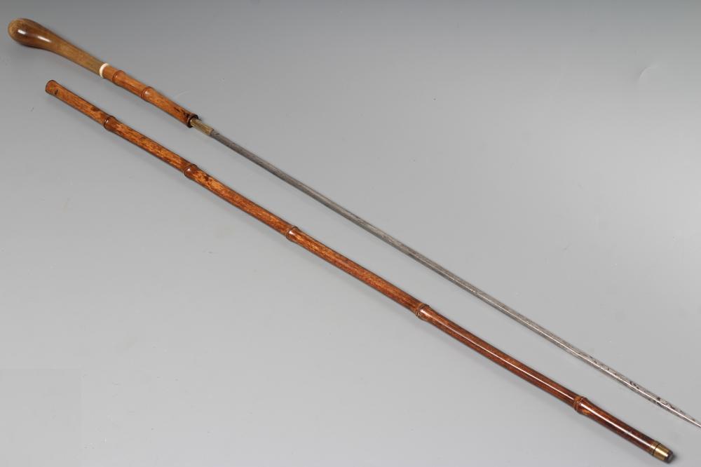 A SWORD CANE, early 20th century, with 21 1/4" square section blade, bamboo shaft, bone ferrule and Image