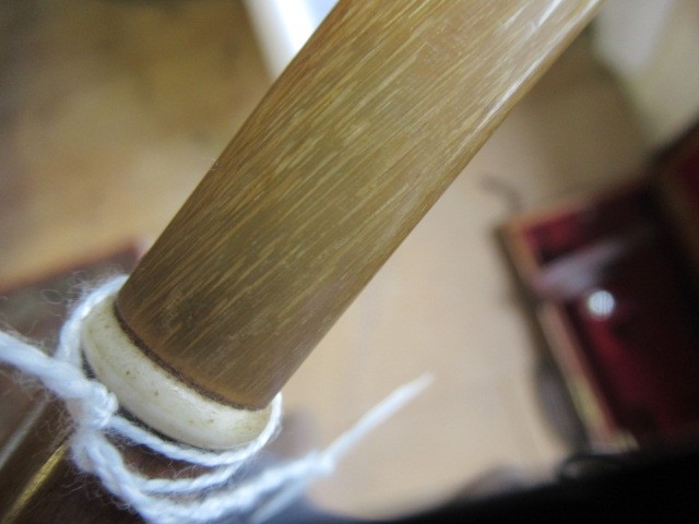 A SWORD CANE, early 20th century, with 21 1/4" square section blade, bamboo shaft, bone ferrule and Image