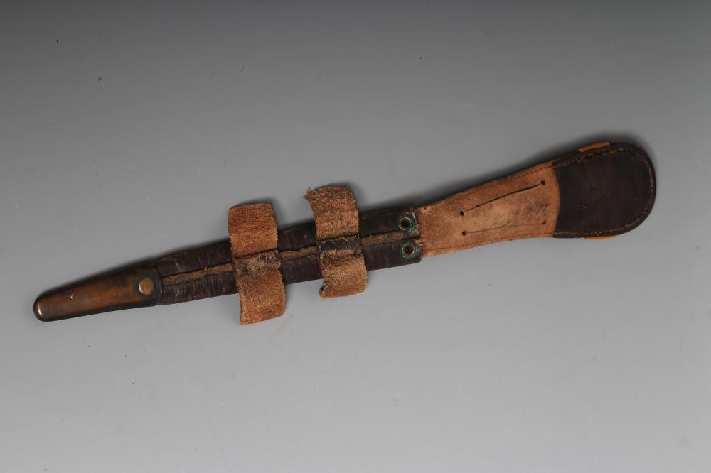 A FAIRBAIRN & SYKES DAGGER with 7" double edged blade, brass crossguard, ribbed brass grip and Image