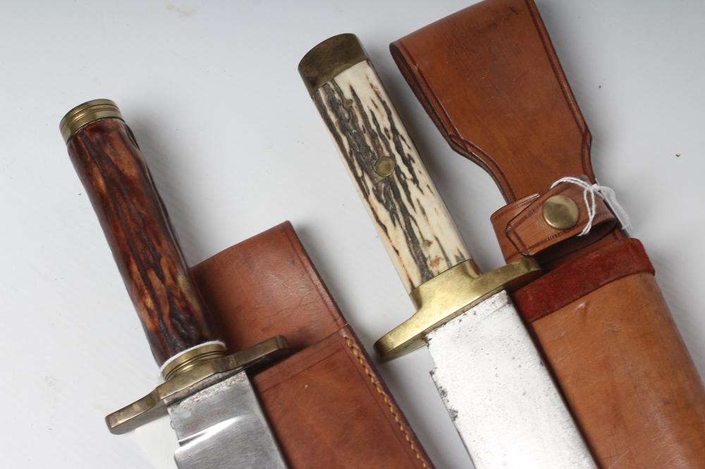 TWO 20TH CENTURY BOWIE KNIVES comprising a J. Howill & Sons knife with 9 7/8" blade and antler grips Image