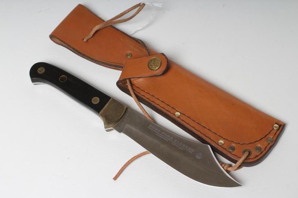 A PUMA 6030 ALASKAN HUNTING KNIFE, 26182, with 5 5/8" clip point blade, two piece ebony grip and Image