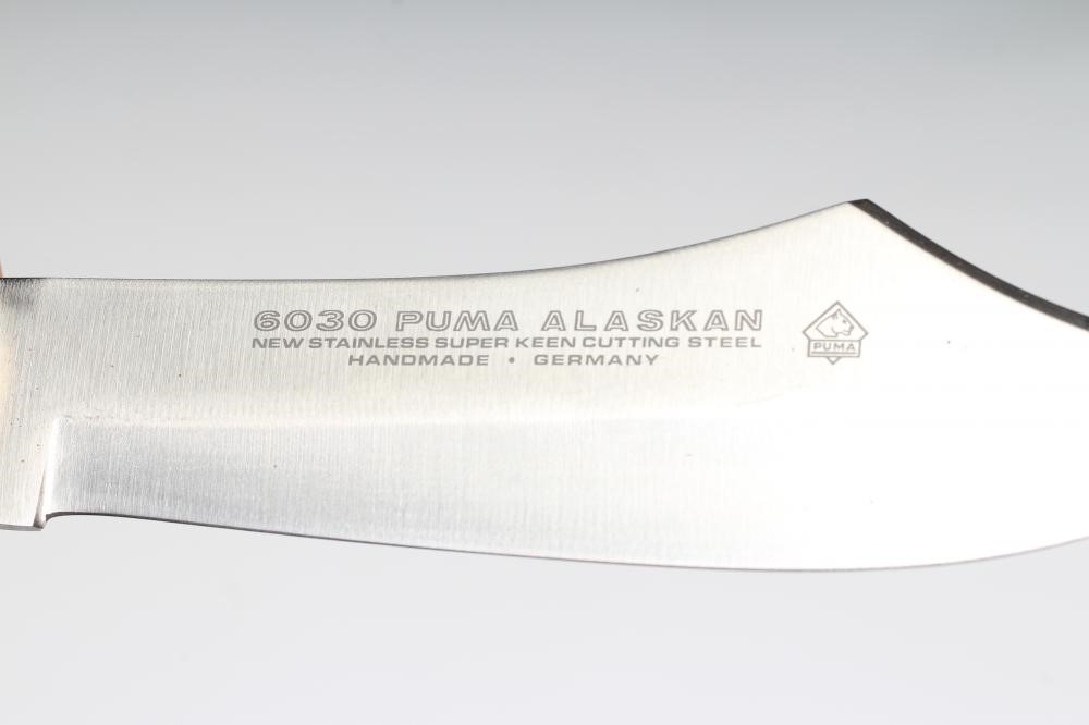 A PUMA 6030 ALASKAN HUNTING KNIFE, 26182, with 5 5/8" clip point blade, two piece ebony grip and Image