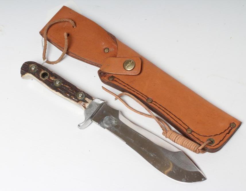 A PUMA 6375 WHITE HUNTER KNIFE, 27282, with 6 " heavy blade, two piece antler grips and leather Image