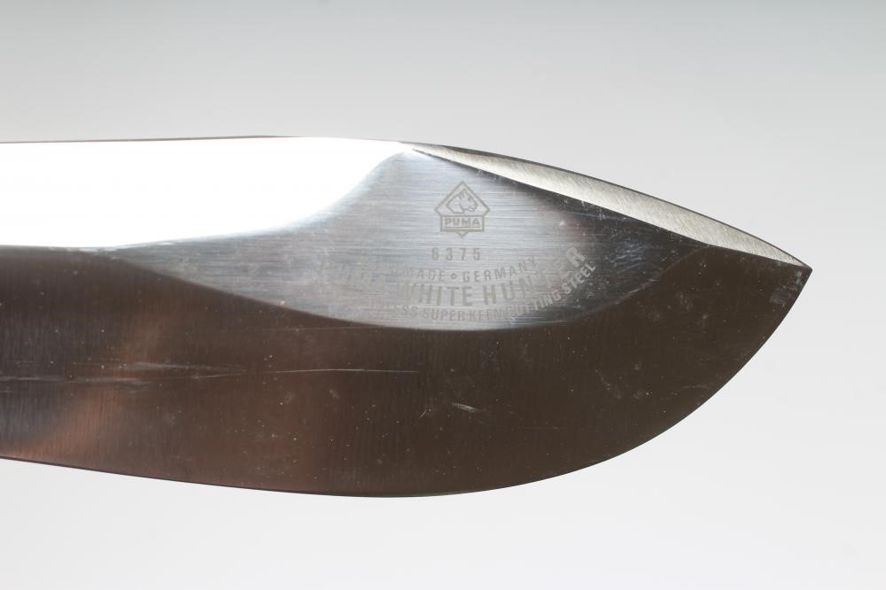 A PUMA 6375 WHITE HUNTER KNIFE, 27282, with 6 " heavy blade, two piece antler grips and leather Image