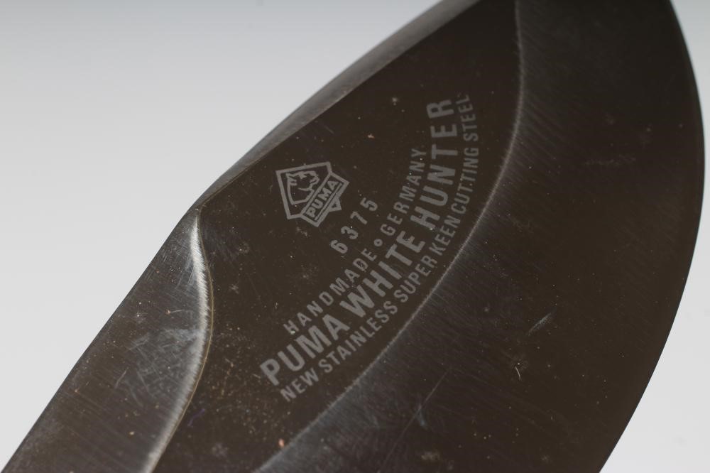 A PUMA 6375 WHITE HUNTER KNIFE, 27282, with 6 " heavy blade, two piece antler grips and leather Image