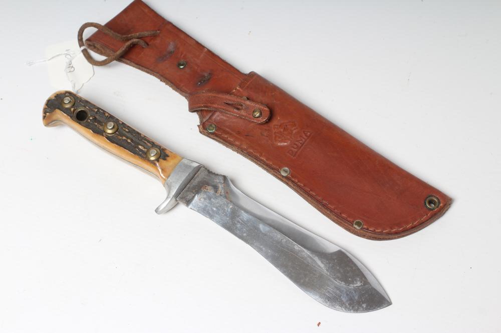 A PUMA 6377 WHITE HUNTER KNIFE, 42607, with 6" heavy blade, two piece antler grips and leather Image
