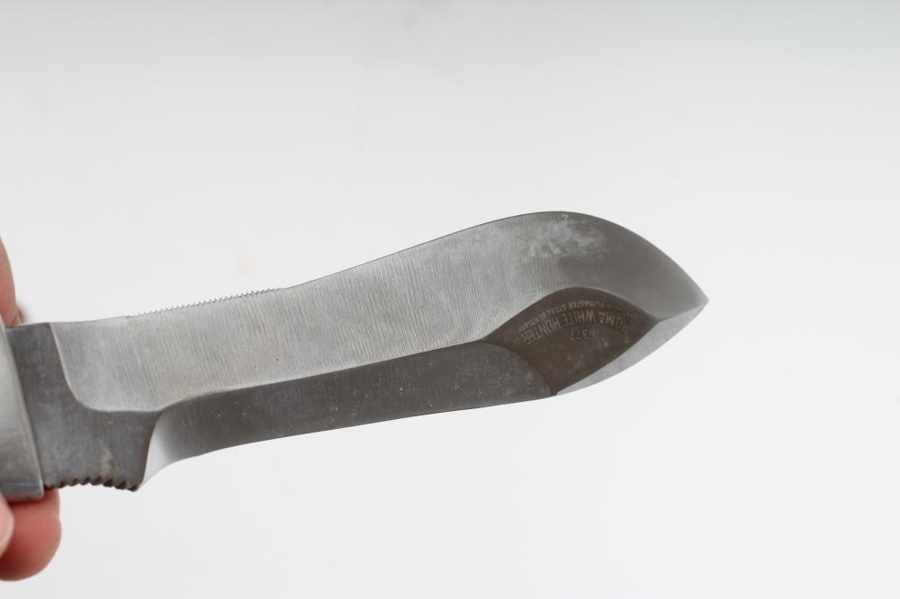 A PUMA 6377 WHITE HUNTER KNIFE, 42607, with 6" heavy blade, two piece antler grips and leather Image