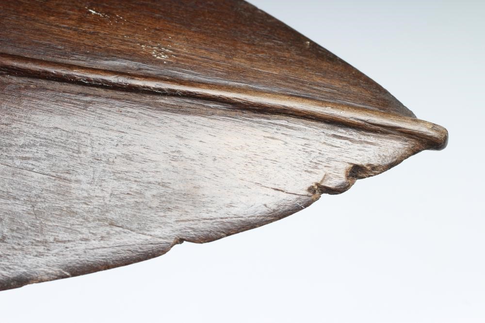 A SOLOMAN ISLANDS PADDLE CLUB of hard wood construction with leaf to one end and spike on the other, Image