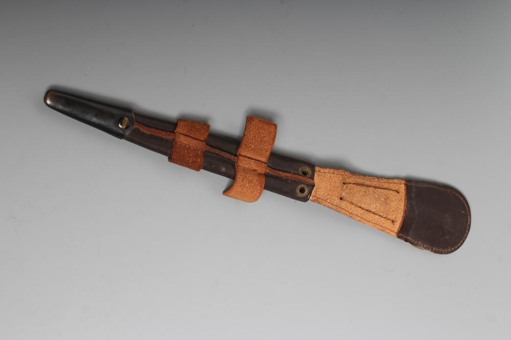 A FAIRBAIRN & SYKES TYPE DAGGER with 7" blade, brass crossguard, brass ribbed grip with broad arrow Image