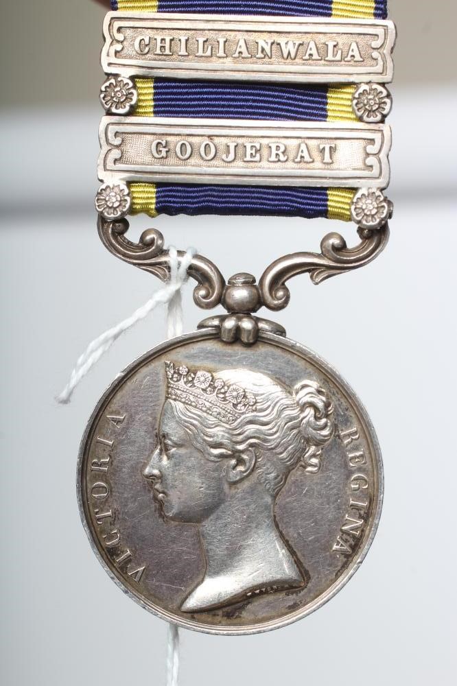 A VICTORIAN PUNJAB MEDAL 1848-49, with blue and yellow ribbon, two clasps for Chilianwala and Image