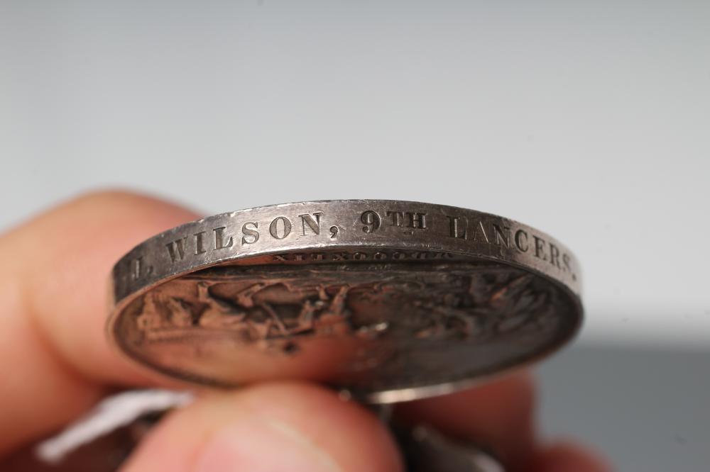 A VICTORIAN PUNJAB MEDAL 1848-49, with blue and yellow ribbon, two clasps for Chilianwala and Image
