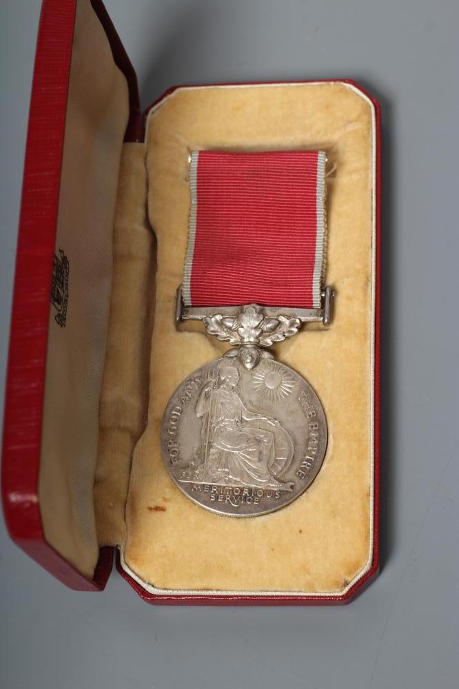 A BRITISH EMPIRE MEDAL awarded to Walter Pedley Bywater, with red and white ribbon, spare ribbon and Image