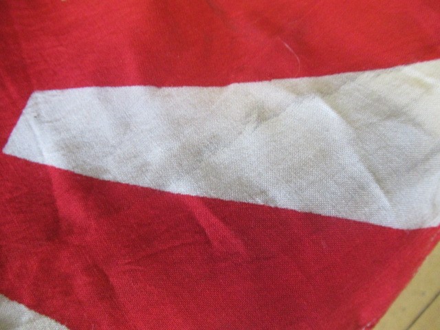 JAPANESE SECOND WORLD WAR ITEMS, comprising a sun flag, a silk script pennant and an Imperial Army Image