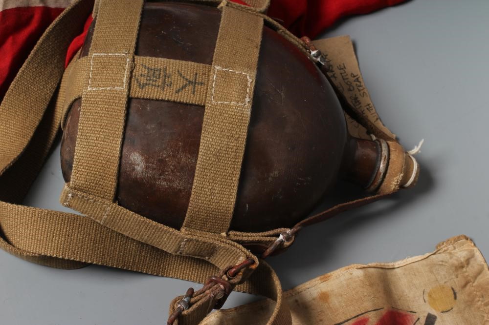 JAPANESE SECOND WORLD WAR ITEMS, comprising a sun flag, a silk script pennant and an Imperial Army Image