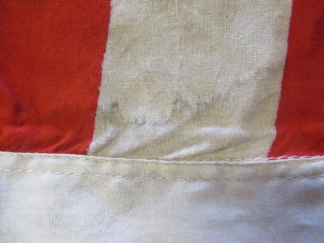 JAPANESE SECOND WORLD WAR ITEMS, comprising a sun flag, a silk script pennant and an Imperial Army Image