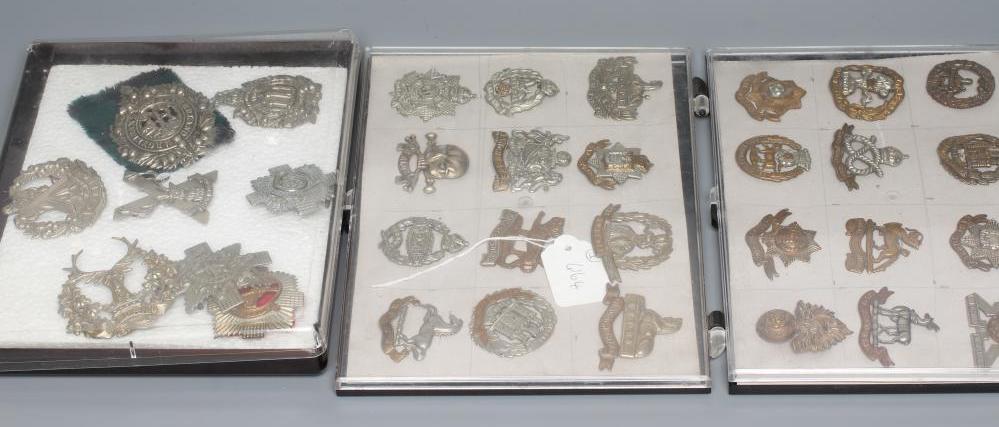 THIRTY TWO BRITISH MILITARY CAP BADGES including English and Scottish regiments, in three plastic Image