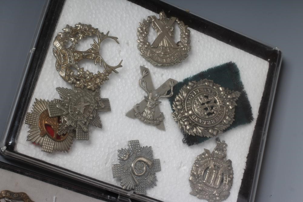 THIRTY TWO BRITISH MILITARY CAP BADGES including English and Scottish regiments, in three plastic Image