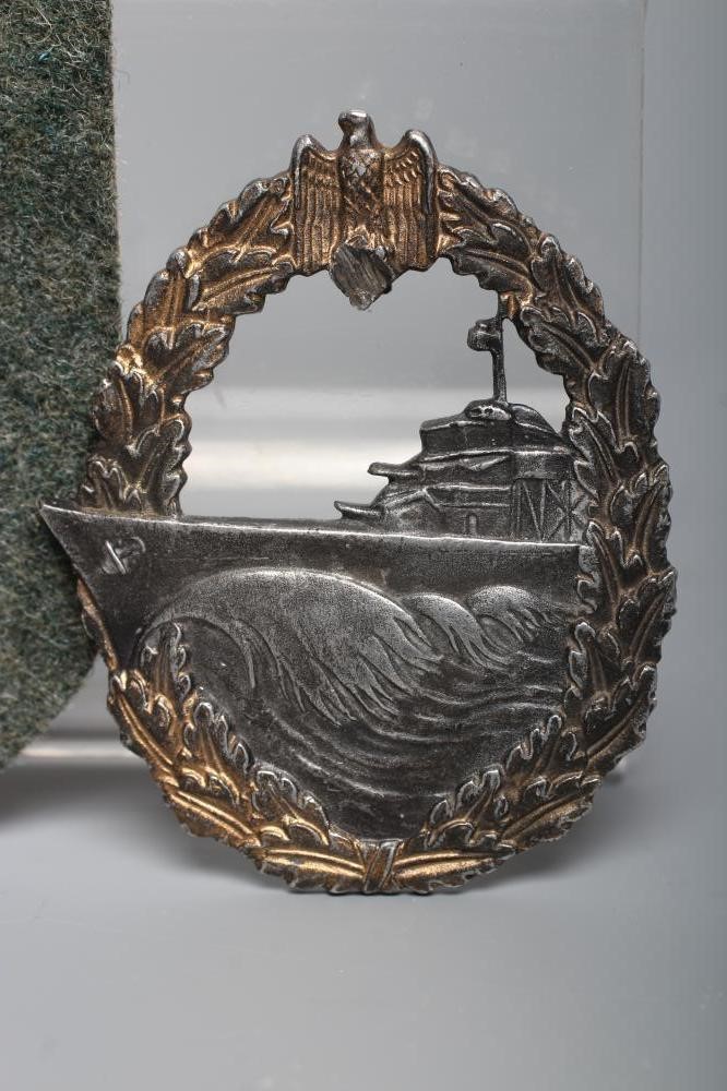 A GERMAN THIRD REICH KRIEGSMARINE DESTROYERS BADGE with rear hook and pin, stamped in relief Image
