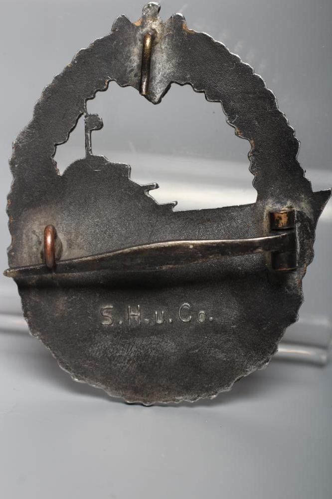 A GERMAN THIRD REICH KRIEGSMARINE DESTROYERS BADGE with rear hook and pin, stamped in relief Image