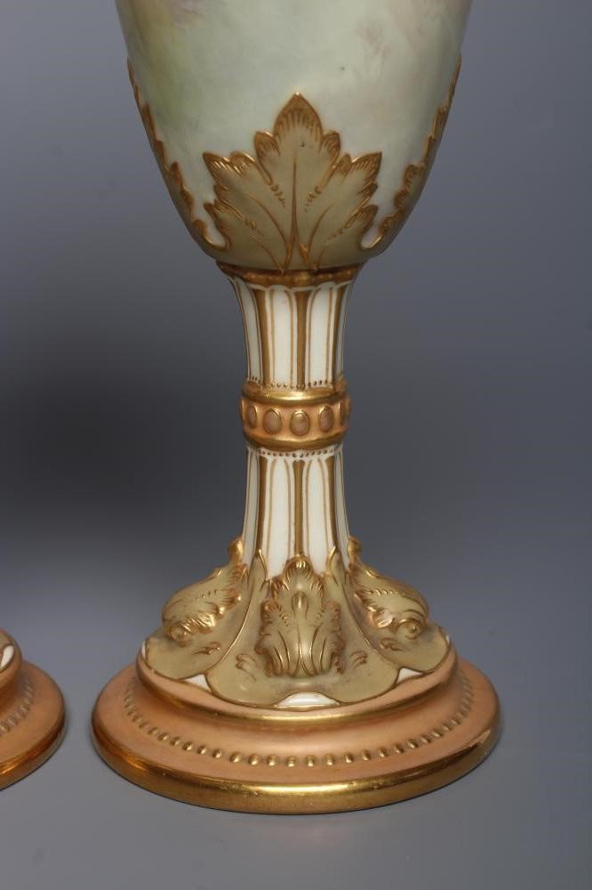 A PAIR OF ROYAL DOULTON CHINA GARNITURE VASES Image