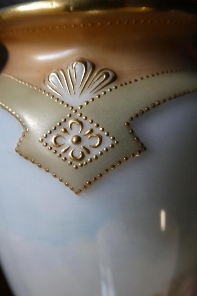 A PAIR OF ROYAL DOULTON CHINA GARNITURE VASES Image