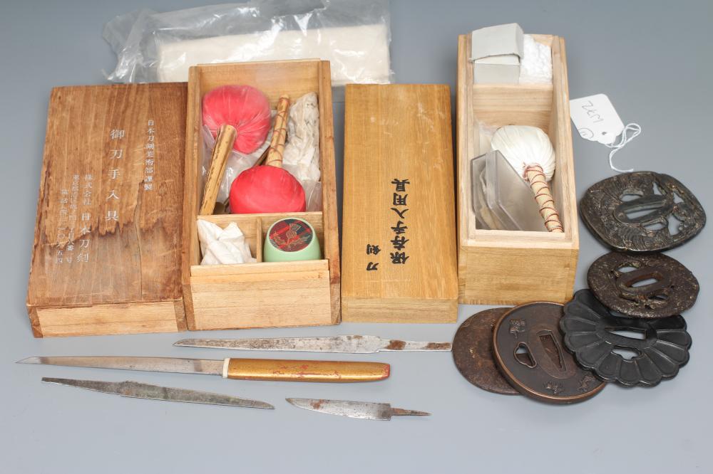 A COLLECTION OF KATANA ACCESSORIES comprising five tsuba, two cleaning kits and a four gokatana Image