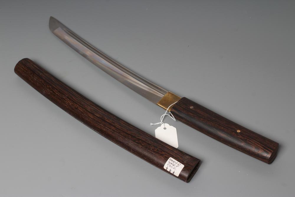 A JAPANESE WAKIZASHI with 11 3/8" fullered and curved blade, highly undulating hamon, unsigned tang Image