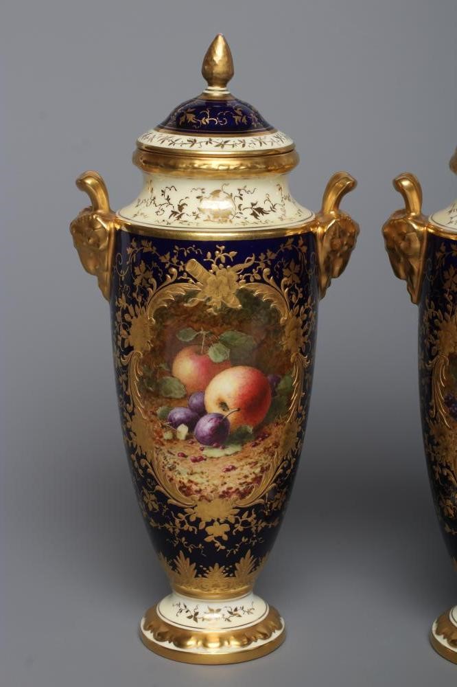 A PAIR OF COALPORT CHINA VASES AND COVERS Image