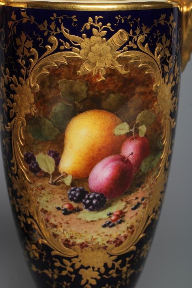 A PAIR OF COALPORT CHINA VASES AND COVERS Image