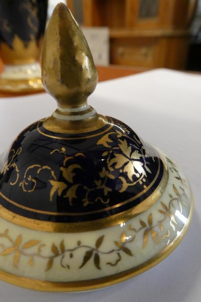 A PAIR OF COALPORT CHINA VASES AND COVERS Image