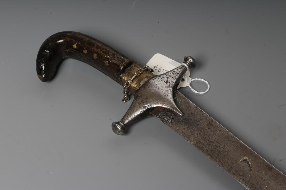 AN INDO-PERSIAN SHAMSHIR, possibly early 19th century, with 29 1/2" curved blade, steel crossguard Image