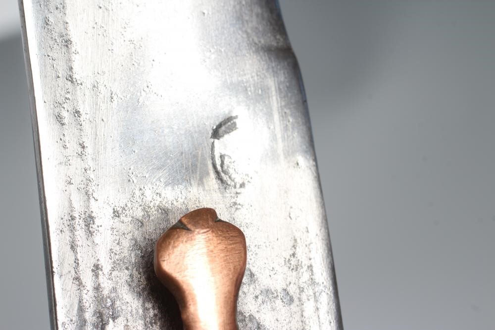 AN INDIAN TALWAR, possibly early 19th century, with 29 1/2" curved thick blade, brass and steel hilt Image