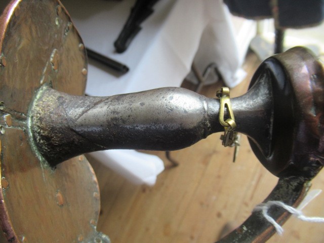 AN INDIAN TALWAR, possibly early 19th century, with 29 1/2" curved thick blade, brass and steel hilt Image