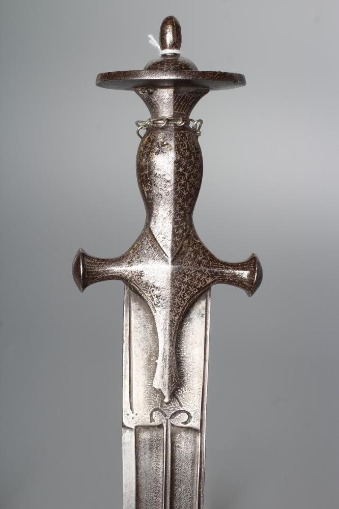 AN INDIAN TALWAR, 19th century, the 29 1/4" curved blade with fine fullers and edge shaping, and Image