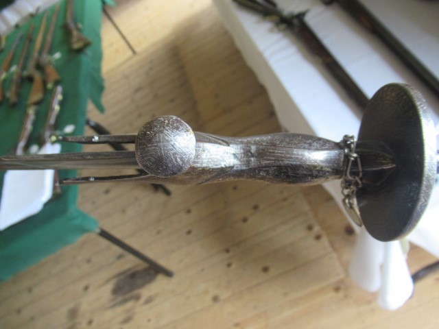 AN INDIAN TALWAR, 19th century, the 29 1/4" curved blade with fine fullers and edge shaping, and Image